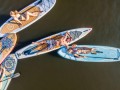 yolo-board-drone-shot-of-multiple-persons-lying-on-sups-in-a-river.jpg