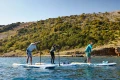 Pompowane deski SUP Gladiator Elite 2026 – pływanie w trójkę, widok z tyłu na wodzie